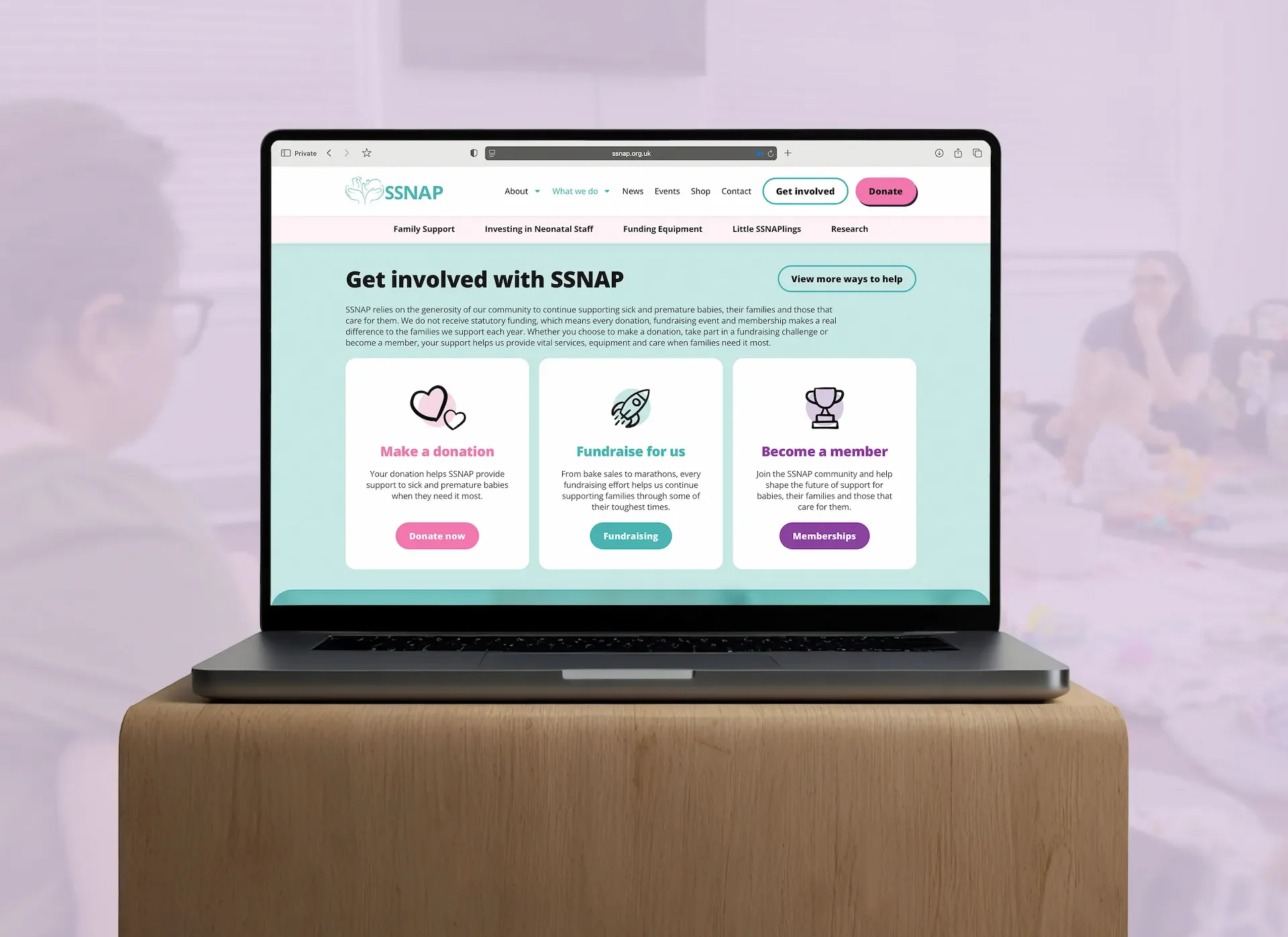 The SSNAP website against the backdrop of a Little SSNAPlings group. the screen highlights ways to Donate, Fundraise or become a Member.